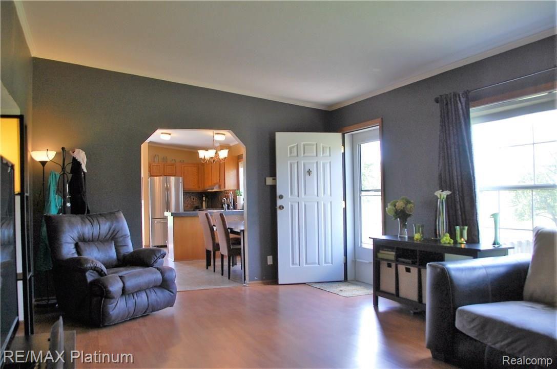 9208 North Nicholson Road Fowlerville, MI 48836 - Photo 9 of 24 Great Room, Foyer open to the Kitchen and Dining Areas