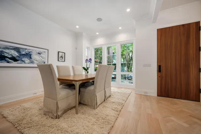 a view of a dining room with furniture window and outside view