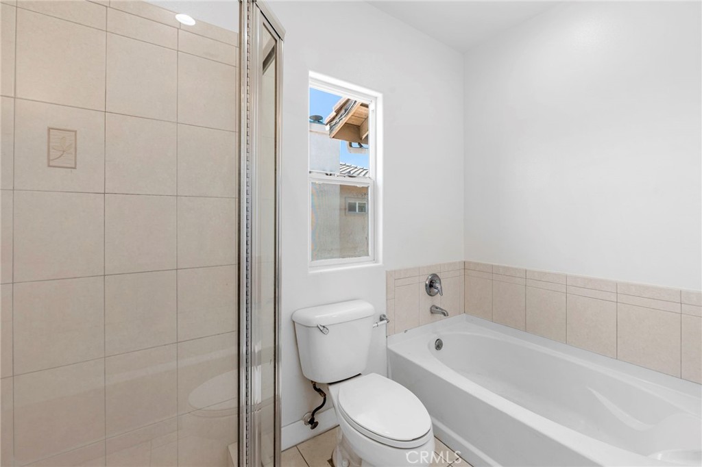 11552 Lower Azusa Road El Monte, CA 91732 - Photo 24 of 41 a bathroom with a toilet and a bathtub