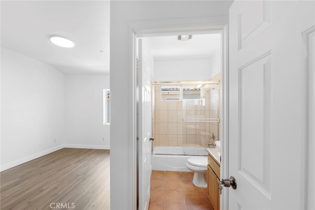 11552 Lower Azusa Road El Monte, CA 91732 - Photo 26 of 41 a bathroom with a glass shower door