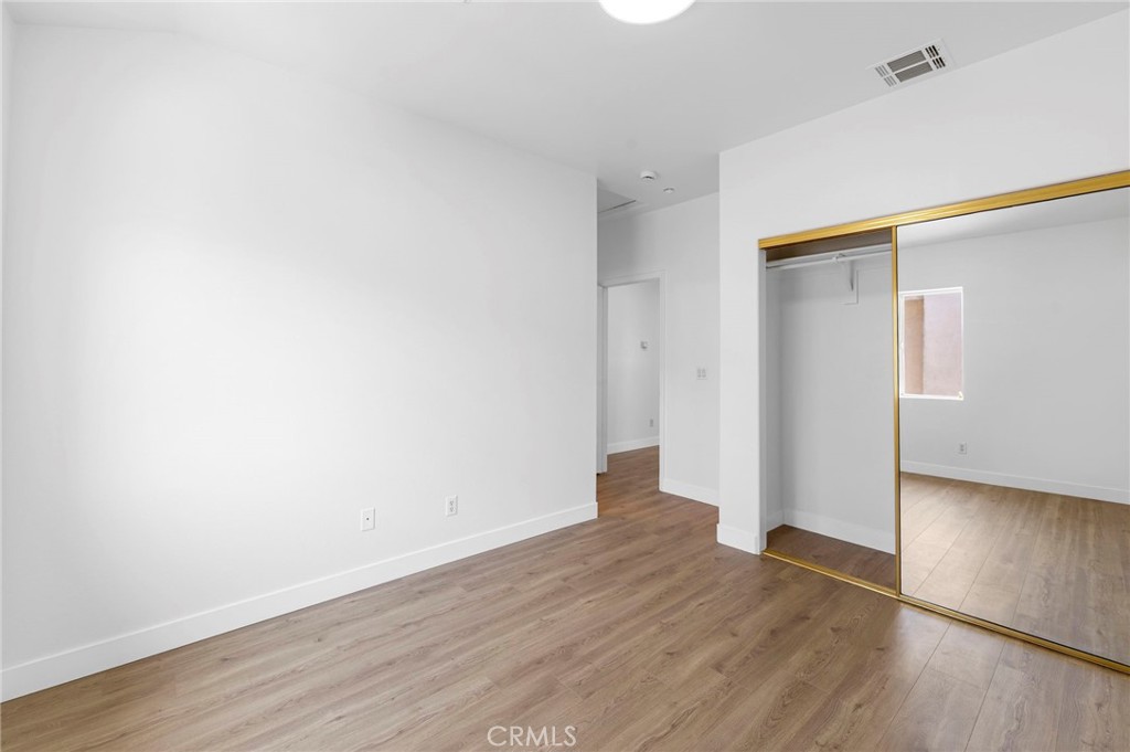11552 Lower Azusa Road El Monte, CA 91732 - Photo 29 of 41 an empty room with wooden floor
