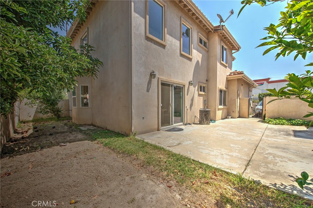 11552 Lower Azusa Road El Monte, CA 91732 - Photo 37 of 41 a view of a house with a yard and potted plants