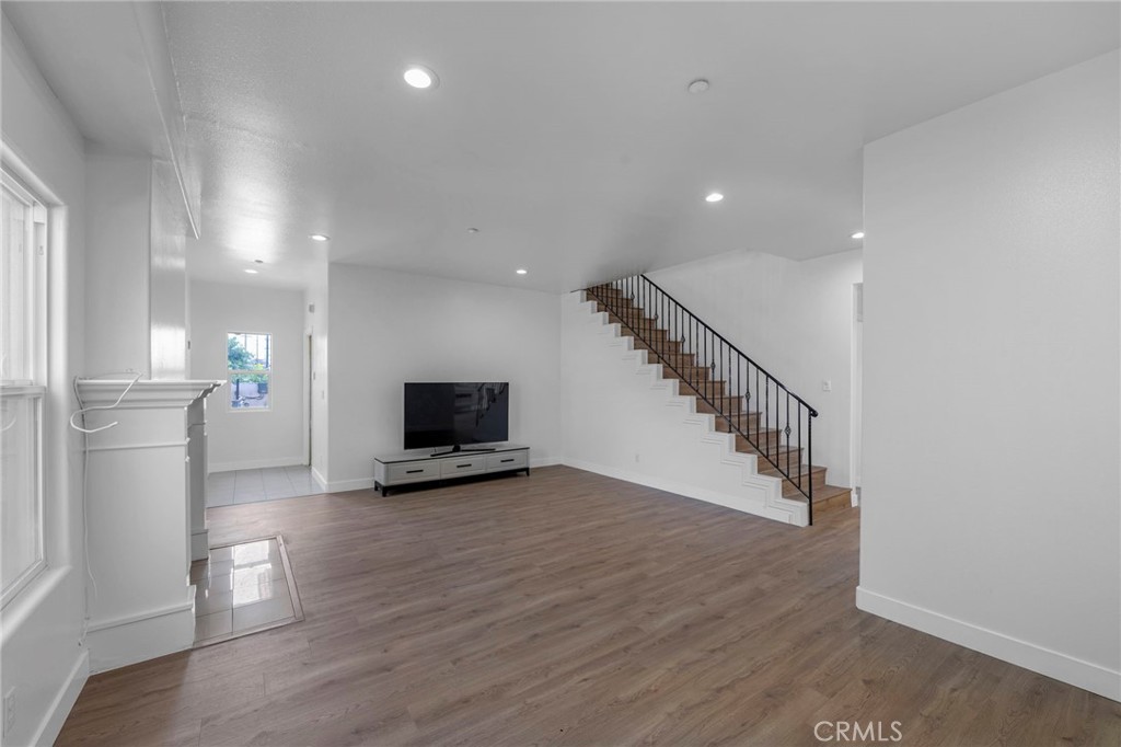 11552 Lower Azusa Road El Monte, CA 91732 - Photo 5 of 41 a view of entryway with wooden floor and stairs