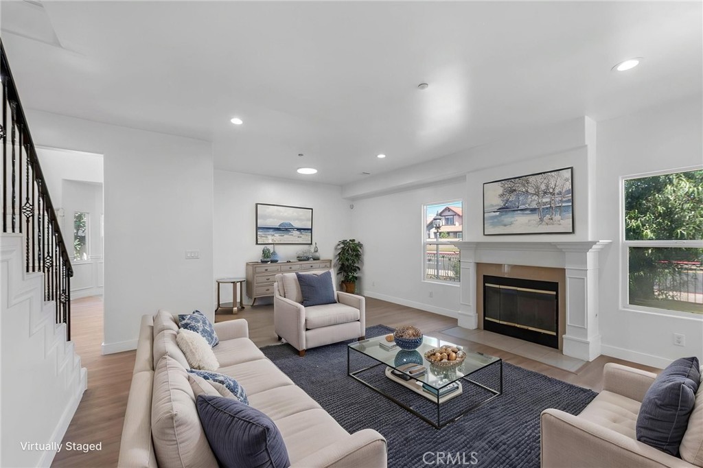 11552 Lower Azusa Road El Monte, CA 91732 - Photo 8 of 41 a living room with furniture fireplace and a window