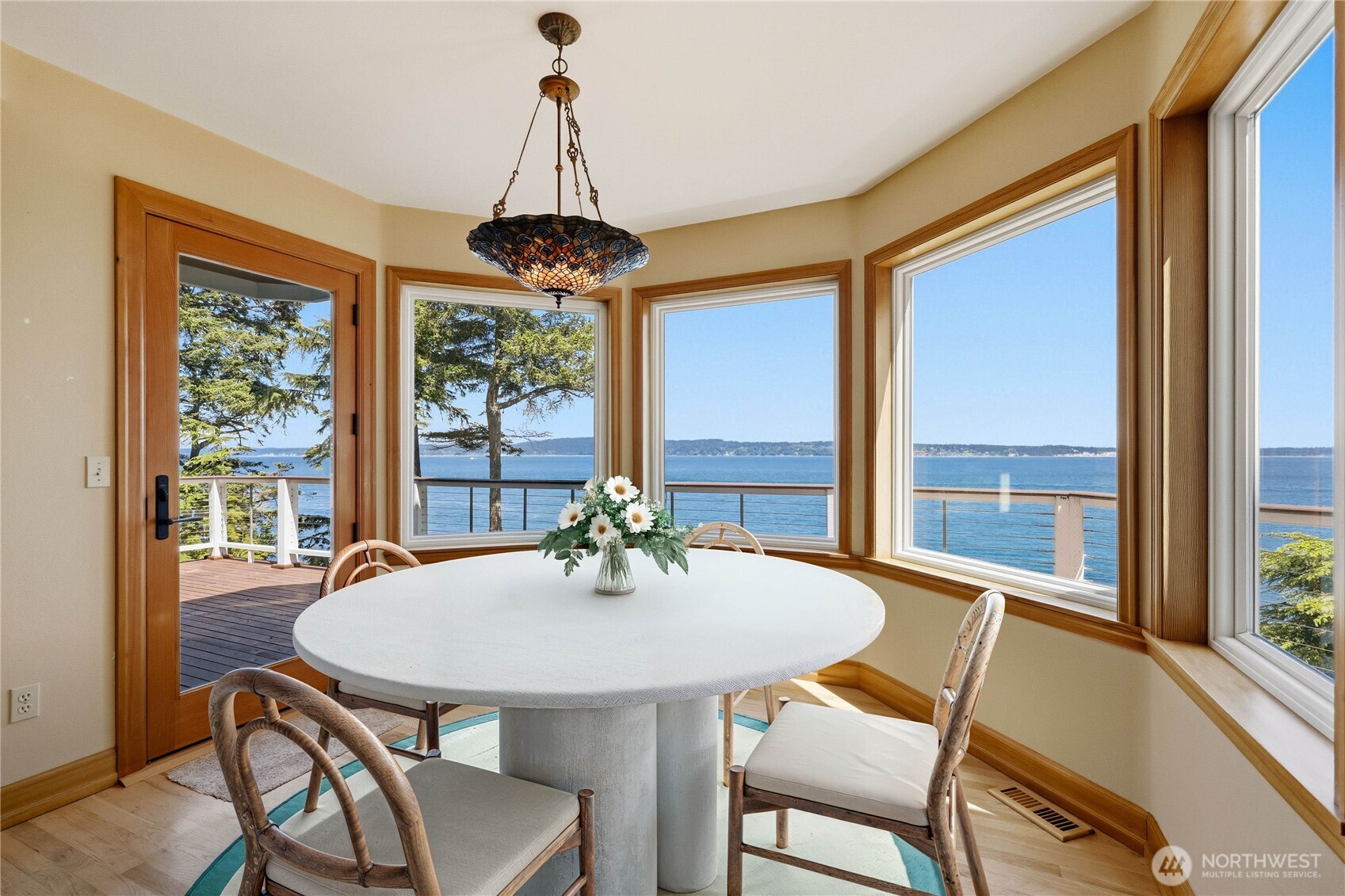 252 Jansen Road Nordland, WA 98358 - Photo 7 of 40 a view of a dining room with furniture window and outside view