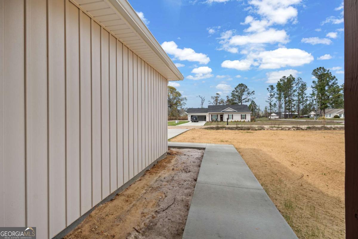 96 Beech Road Hazlehurst, GA 31539 - Photo 13 of 32 a view of swimming pool with outdoor seating