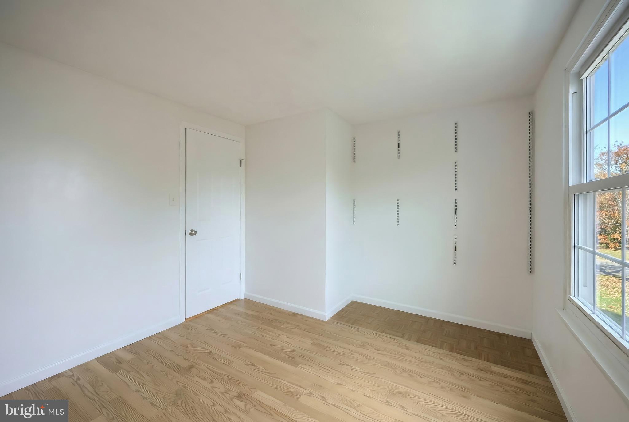2 Dutton Road New Freedom, PA 17349 - Photo 18 of 39 a view of empty room with wooden floor and fan