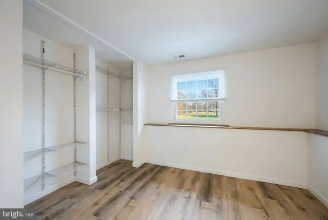 a view of livingroom with washer and dryer