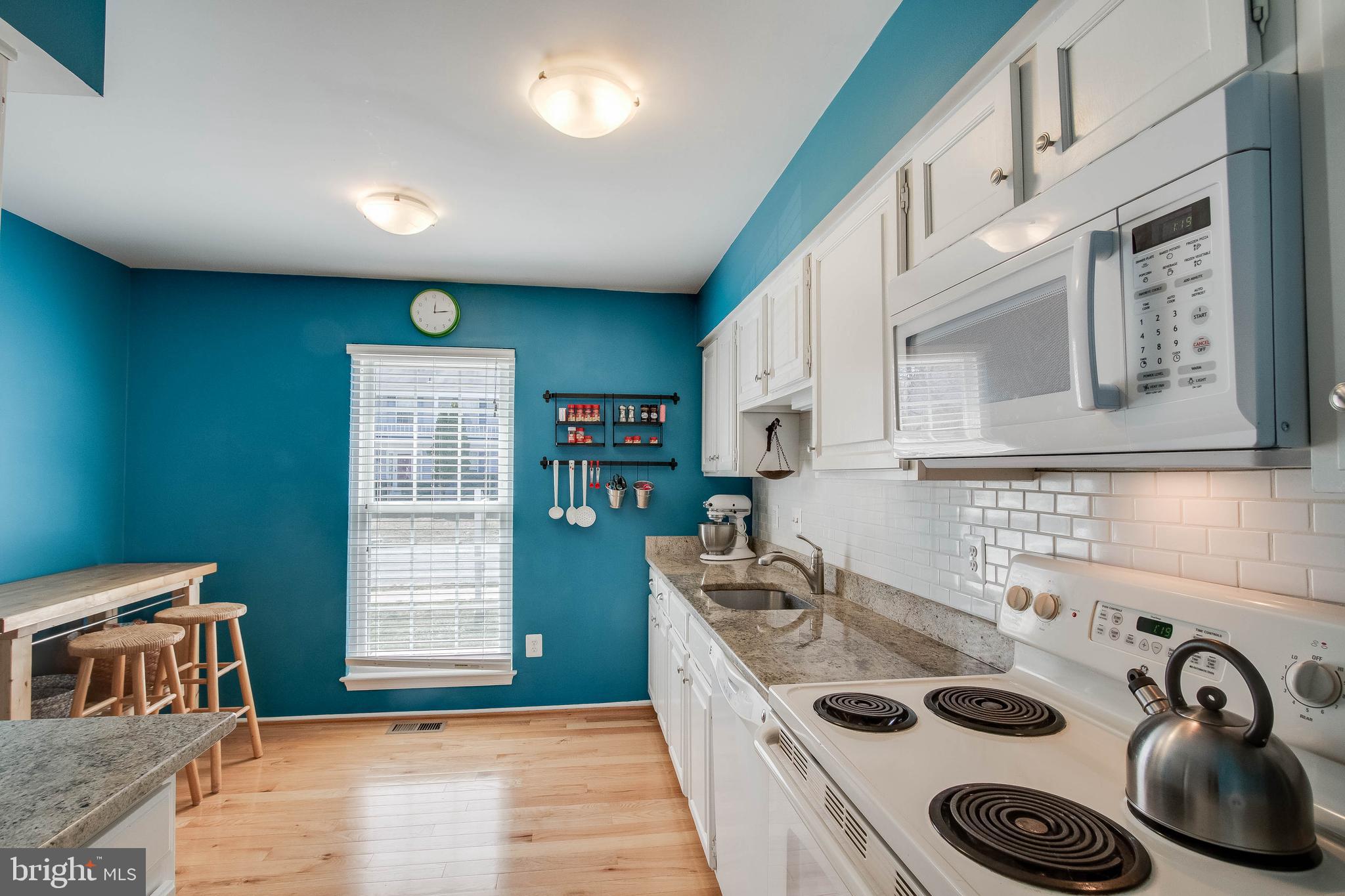 5995 Powell's Landing Road Burke, VA 22015 - Photo 7 of 28 Light-filled kitchen