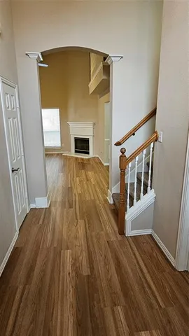 a view of front door of house with stairs