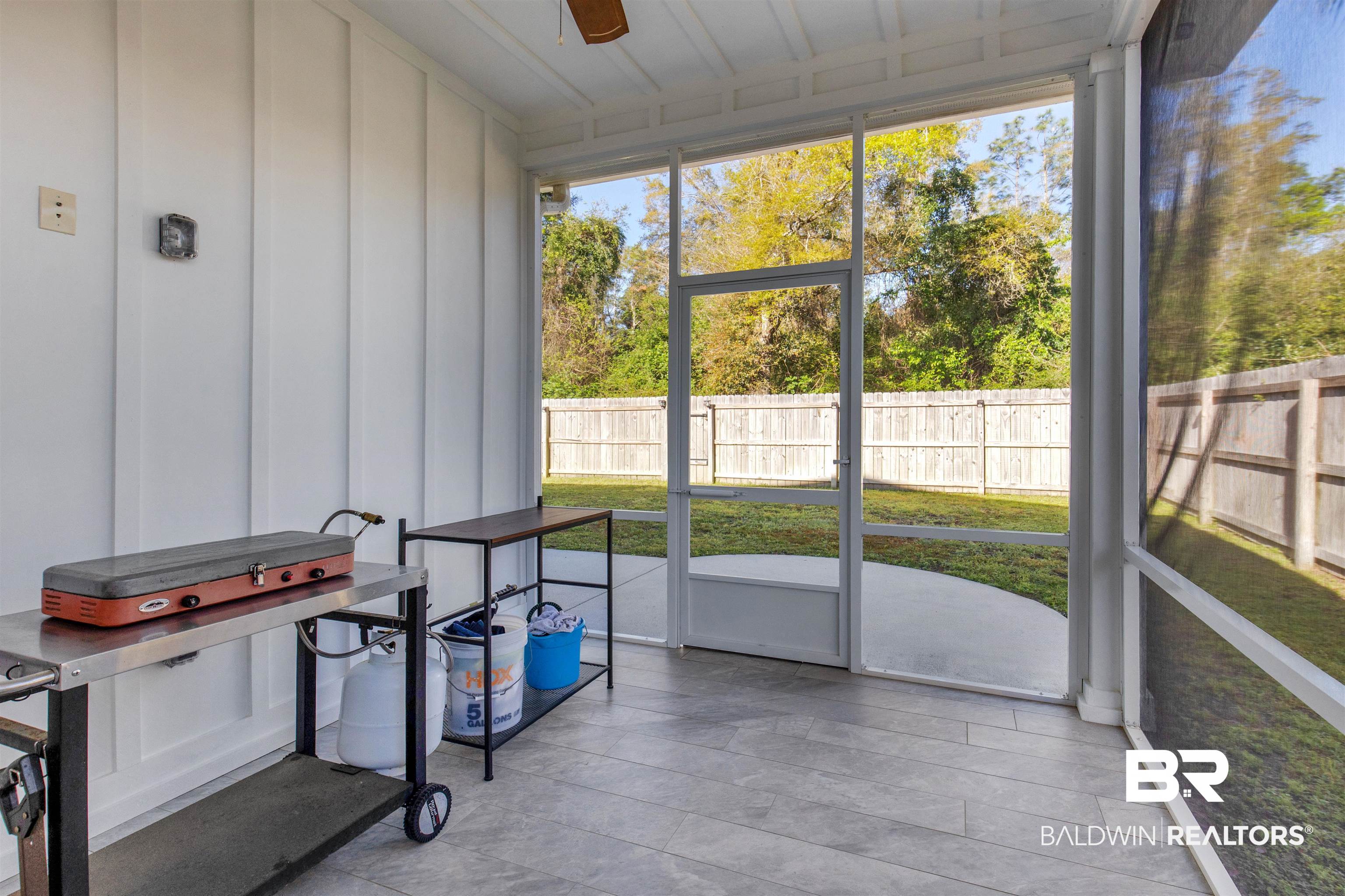 8069 Carmel Circle Foley, AL 36535 - Photo 19 of 23 Sunroom featuring a ceiling fan