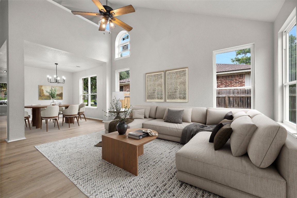 17205 Sandwick Drive Pflugerville, TX 78660 - Photo 1 of 1 a living room with furniture and a large window