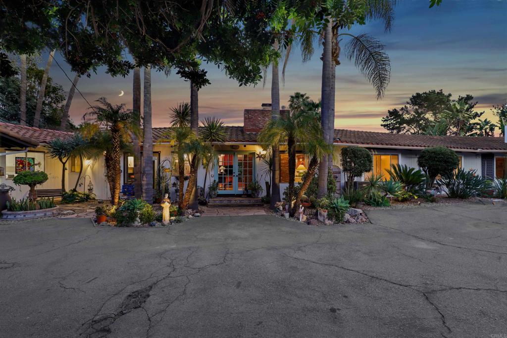 a view of a street with a building in the background