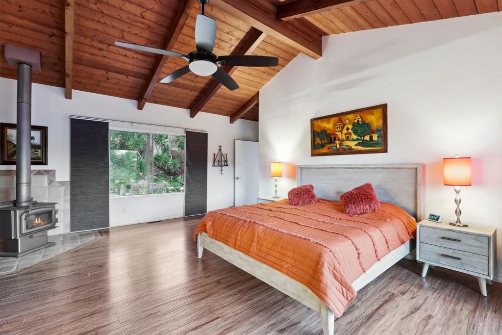 826 Ora Avo Drive Vista, CA 92084 - Photo 22 of 52 a bedroom with a bed and a view of bathroom