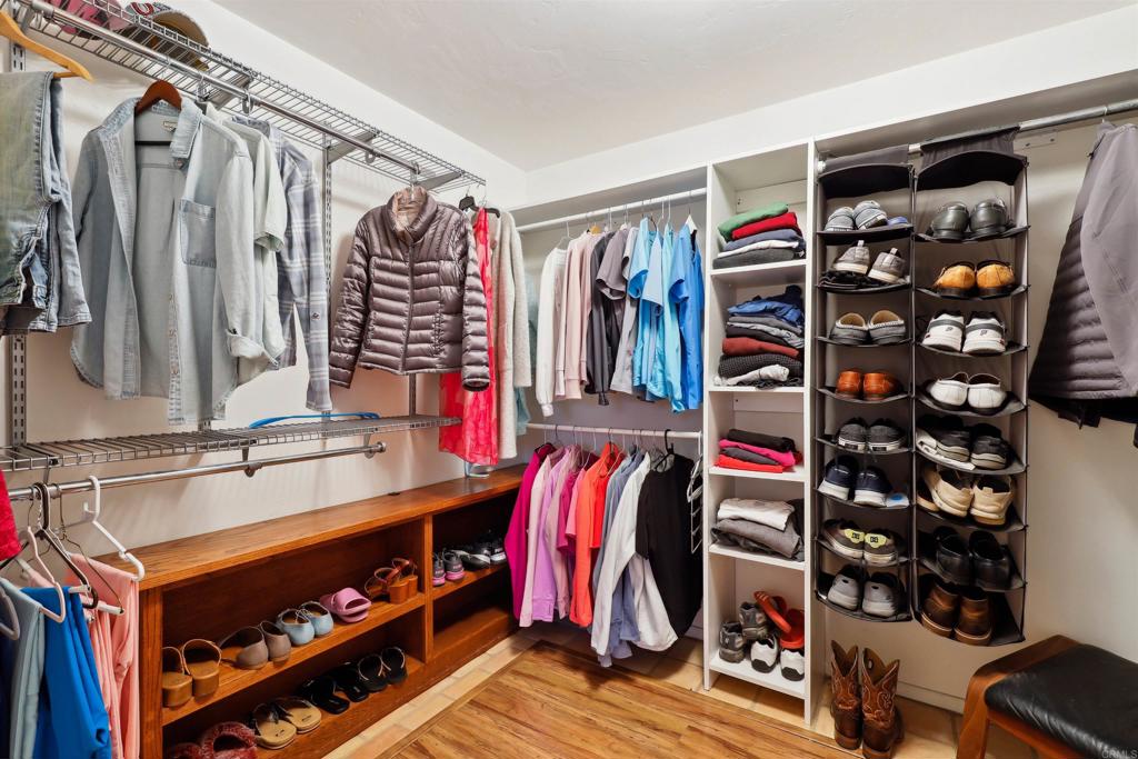 826 Ora Avo Drive Vista, CA 92084 - Photo 25 of 52 a view of walk in closet with clothes and shoes