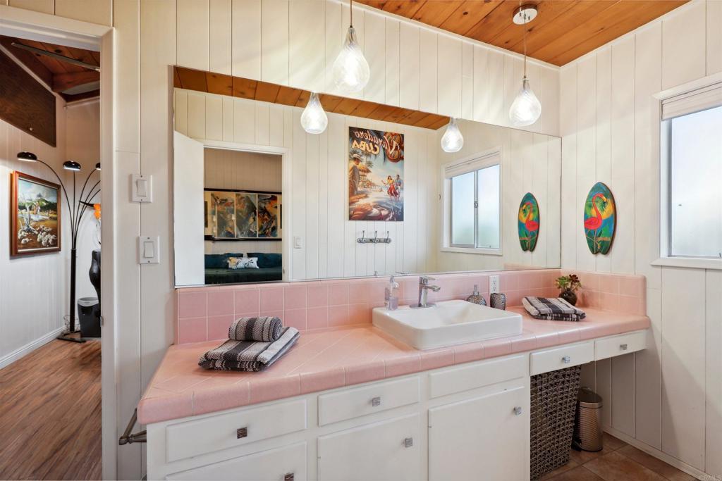 826 Ora Avo Drive Vista, CA 92084 - Photo 27 of 52 a bathroom with a sink and a mirror