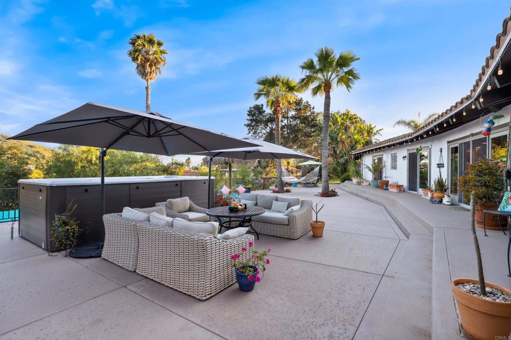 826 Ora Avo Drive Vista, CA 92084 - Photo 32 of 52 a backyard of a house with table and chairs