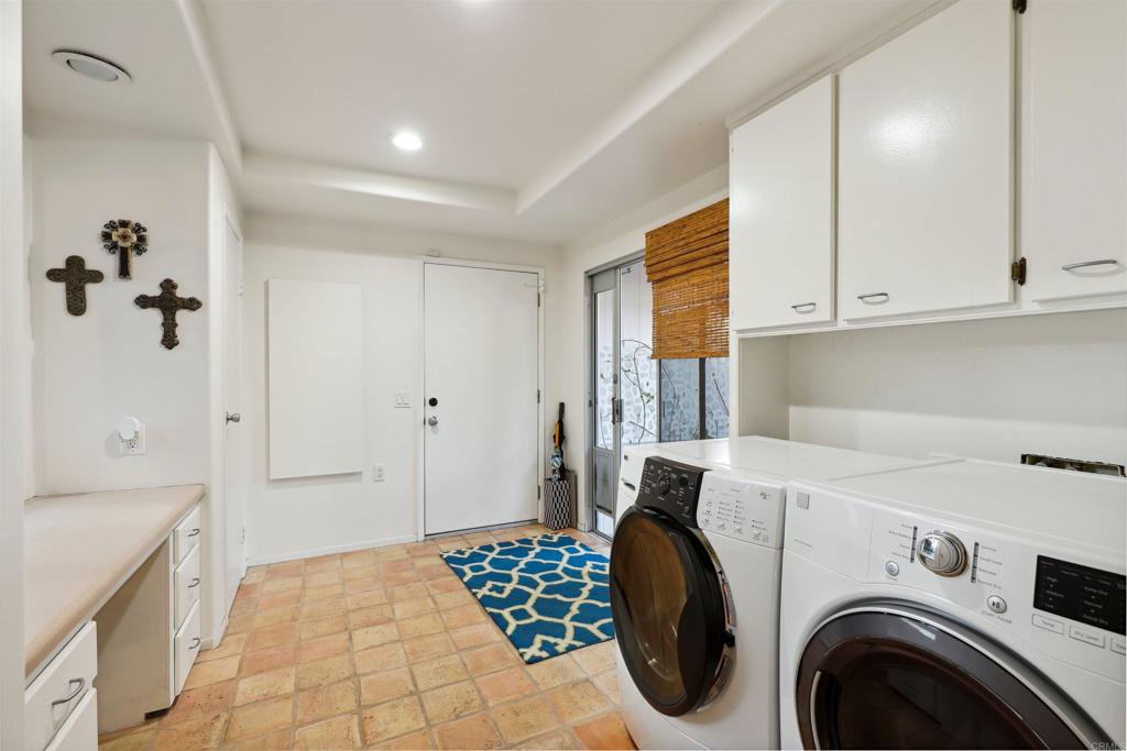 826 Ora Avo Drive Vista, CA 92084 - Photo 39 of 52 a utility room with closet dryer and washer