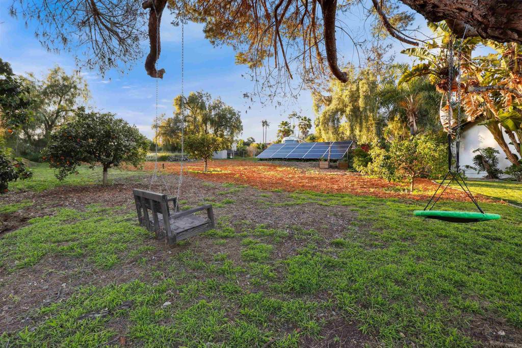 826 Ora Avo Drive Vista, CA 92084 - Photo 41 of 52 a backyard of a house with table and chairs