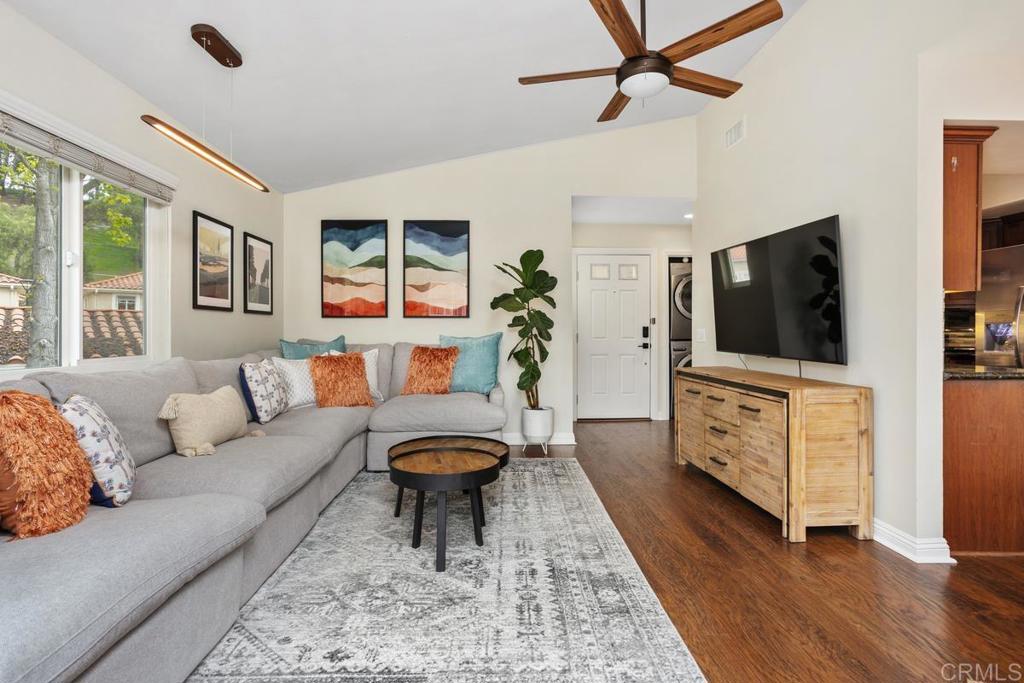 102 Sea Cliff Way Oceanside, CA 92056 - Photo 17 of 44 a living room with furniture and a flat screen tv