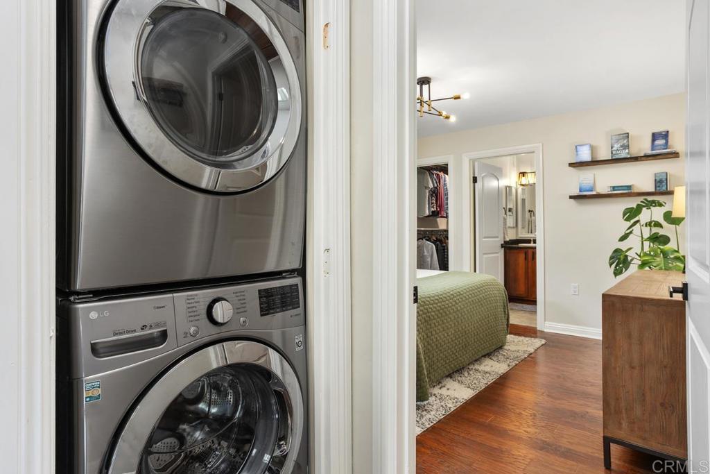 102 Sea Cliff Way Oceanside, CA 92056 - Photo 18 of 44 a view of a hallway with washer and dryer