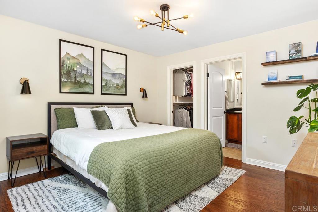 102 Sea Cliff Way Oceanside, CA 92056 - Photo 20 of 44 a bedroom with a bed and a window