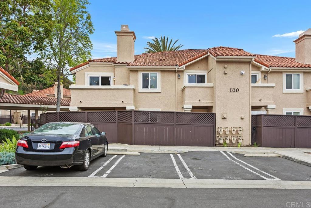 102 Sea Cliff Way Oceanside, CA 92056 - Photo 30 of 44 a car parked in front of a house