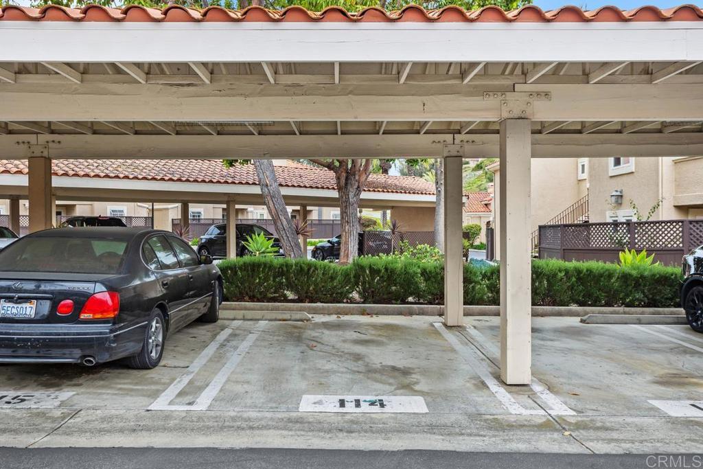 102 Sea Cliff Way Oceanside, CA 92056 - Photo 31 of 44 a front view of a house with cars parked
