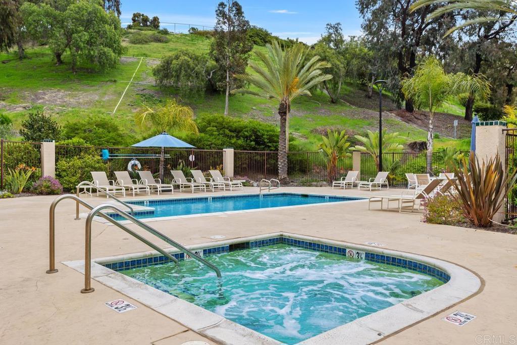 102 Sea Cliff Way Oceanside, CA 92056 - Photo 33 of 44 swimming pool view with a garden