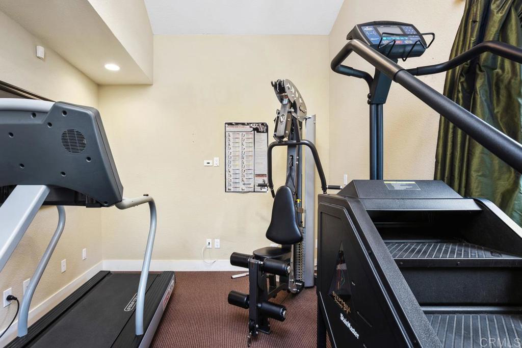 102 Sea Cliff Way Oceanside, CA 92056 - Photo 41 of 44 a view of a room with gym equipment
