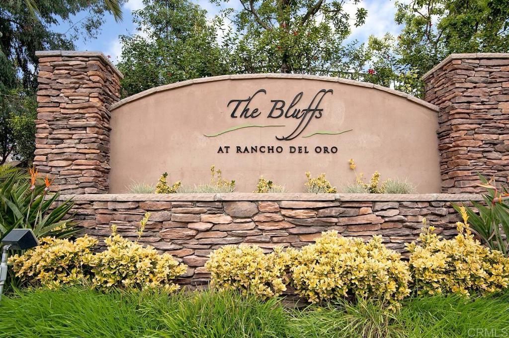 102 Sea Cliff Way Oceanside, CA 92056 - Photo 42 of 44 a sign on the side of the road