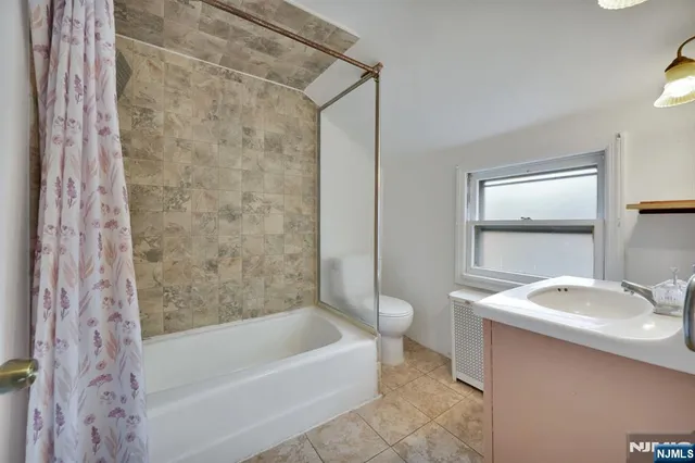 a view of road with large trees