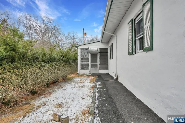 a view of an empty room with a balcony