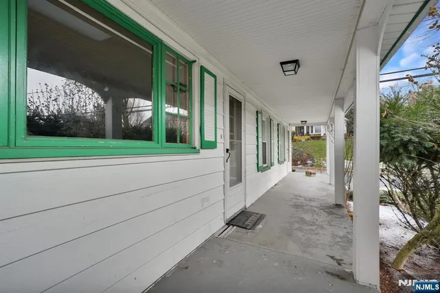 a view of a house with a porch