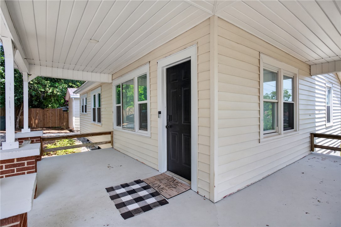 115 Pelfrey Street Seneca, SC 29672 - Photo 31 of 46 A welcoming covered porch with a sturdy foundation offers a charming entry to this residence.