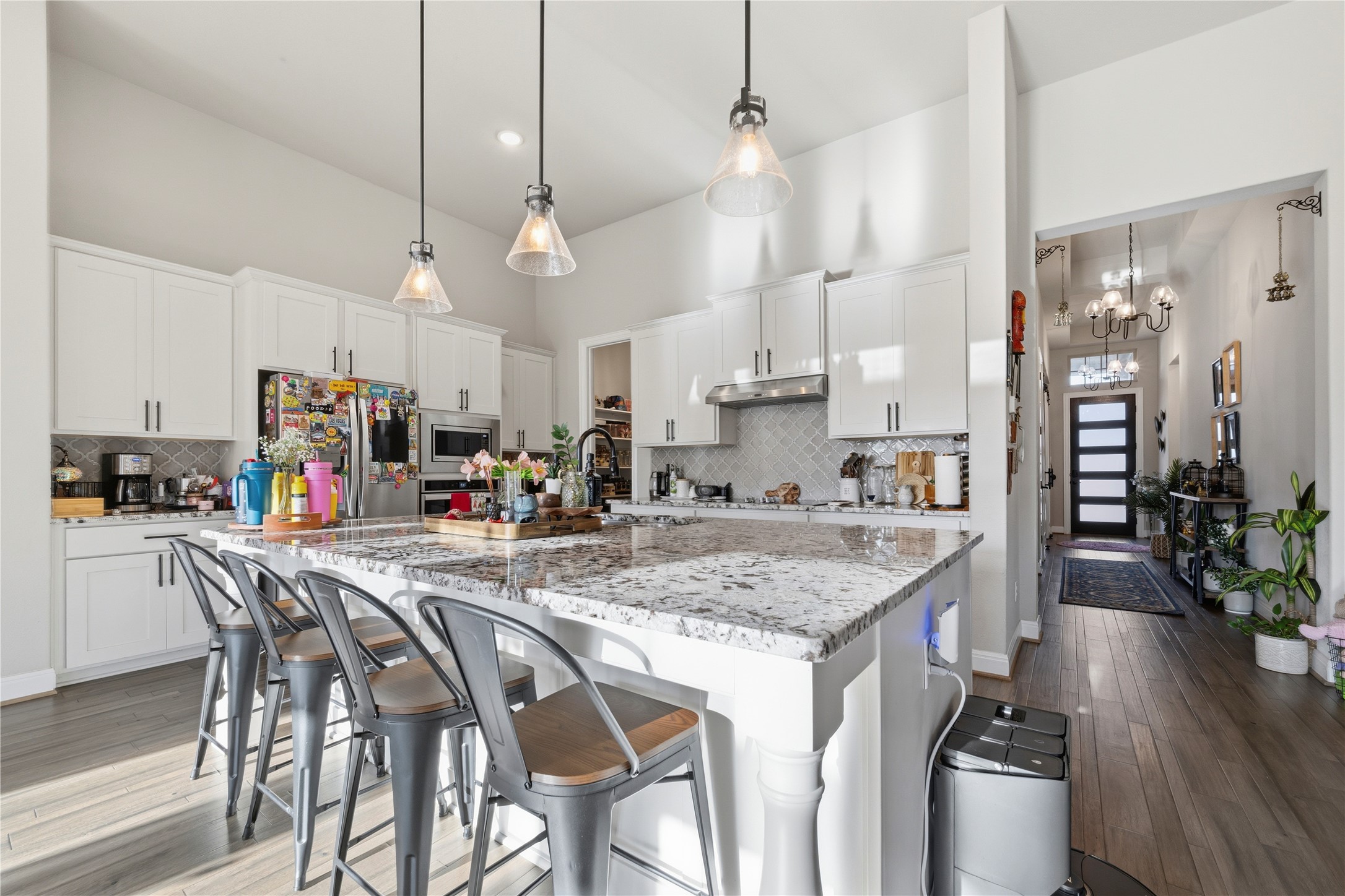 138 Rpd Spgs Cove Georgetown, TX 78628 - Photo 11 of 37 a large kitchen with a table and chairs