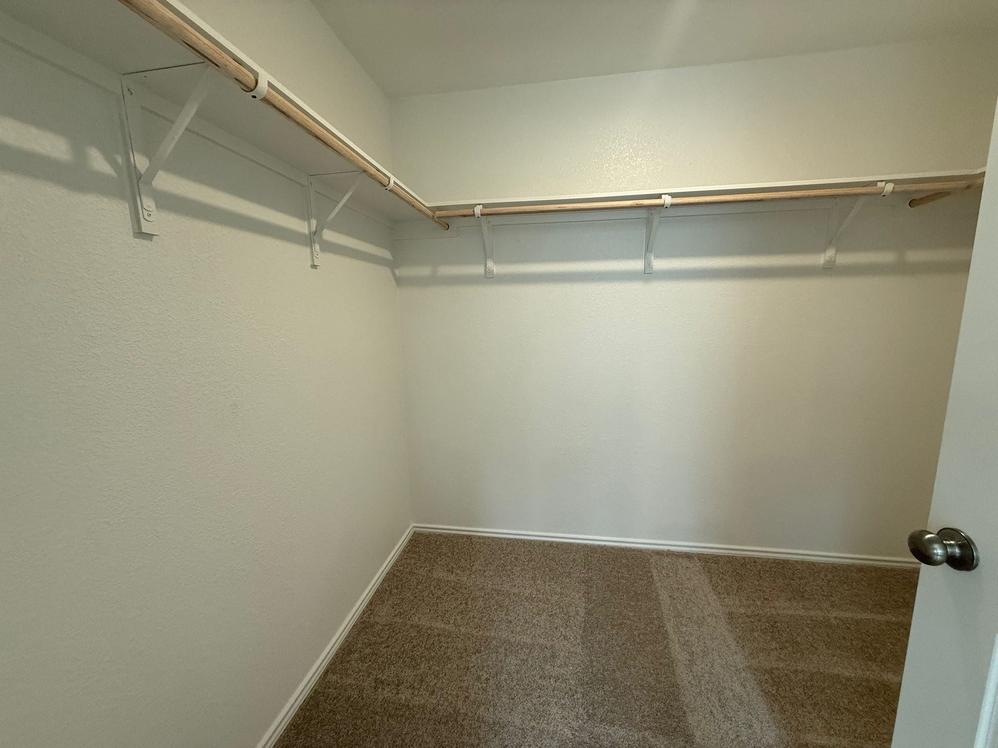 125 Sormonne Loop Kyle, TX 78640 - Photo 27 of 35 Spacious closet featuring carpet