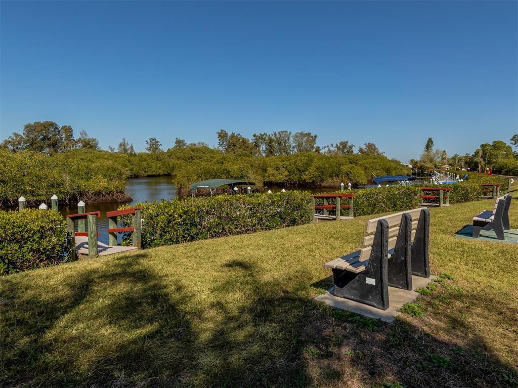 122 Rarotonga Road North Port, FL 34287 - Photo 48 of 48 a view of a lake with houses