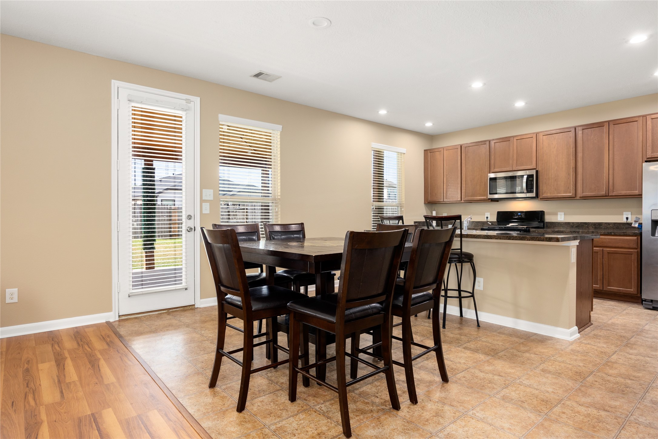 22414 Bellwick Ridge Lane Katy, TX 77449 - Photo 9 of 23 Bright dining space conveniently located next to the kitchen, perfect for family meals and gatherings