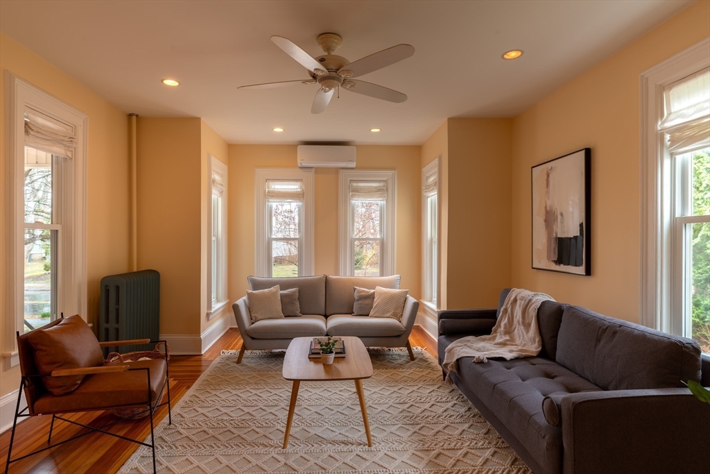 29 Pomeroy Terrace Northampton, MA 01060 - Photo 1 of 23 a living room with furniture and a large window