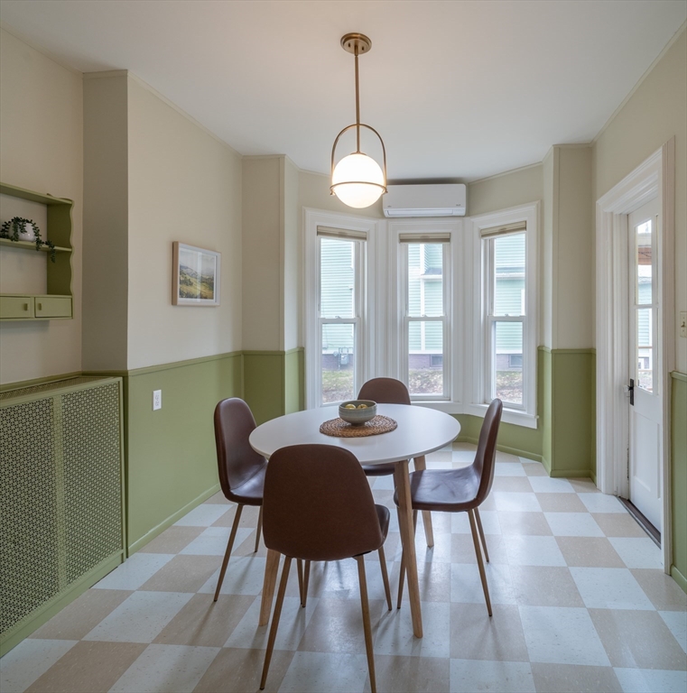 29 Pomeroy Terrace Northampton, MA 01060 - Photo 11 of 23 a view of a dining room with furniture window and wooden floor
