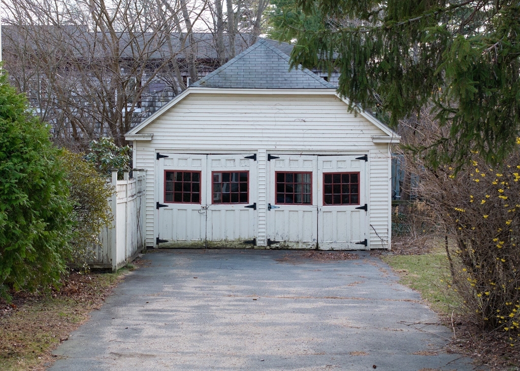 29 Pomeroy Terrace Northampton, MA 01060 - Photo 22 of 23 a view of a house with a large window and wooden fence