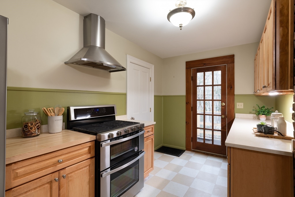 29 Pomeroy Terrace Northampton, MA 01060 - Photo 10 of 23 a kitchen with a stove and a window