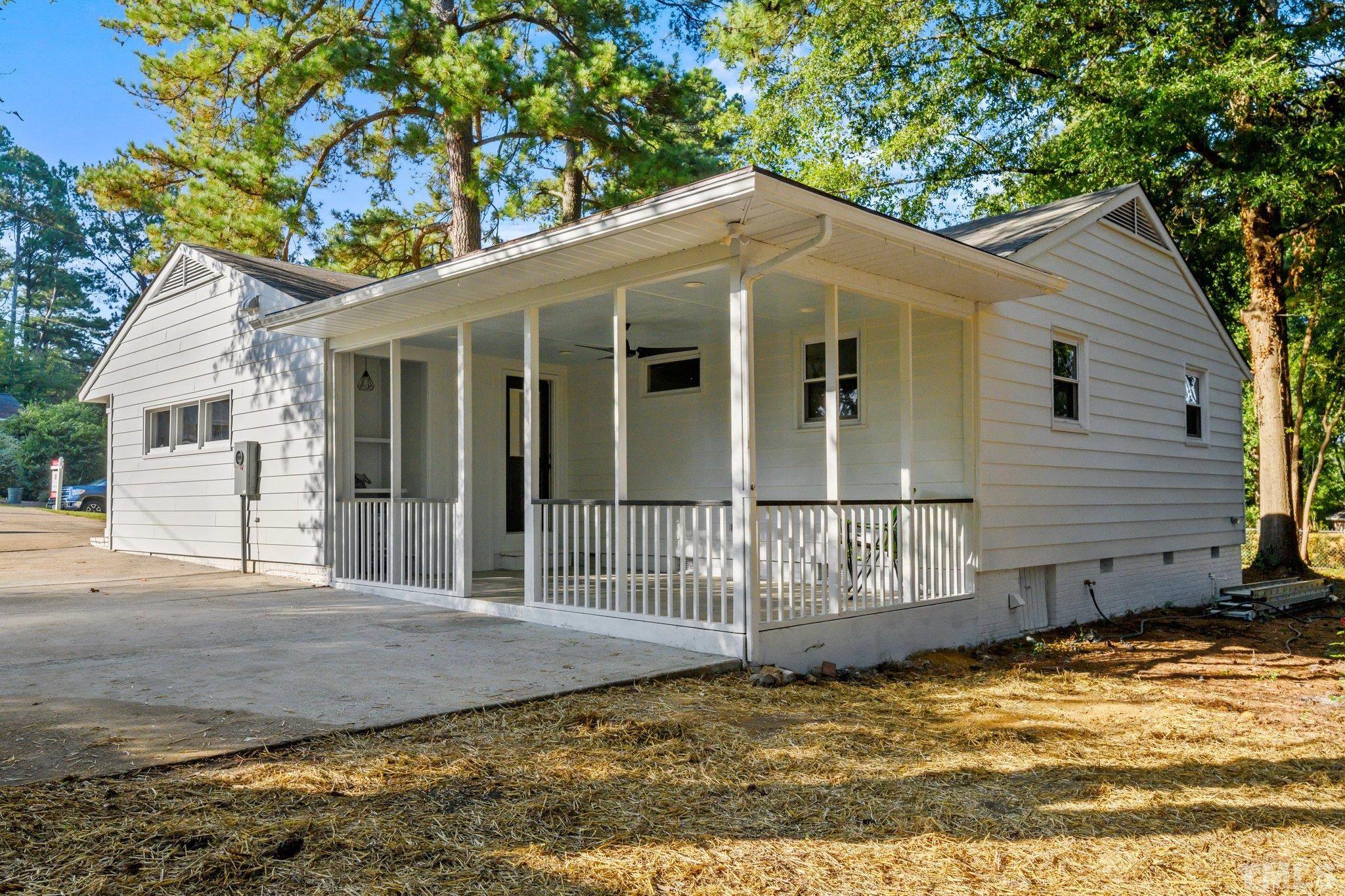 317 Quail Drive Raleigh, NC 27604 - Photo 21 of 29 a house with trees in the background