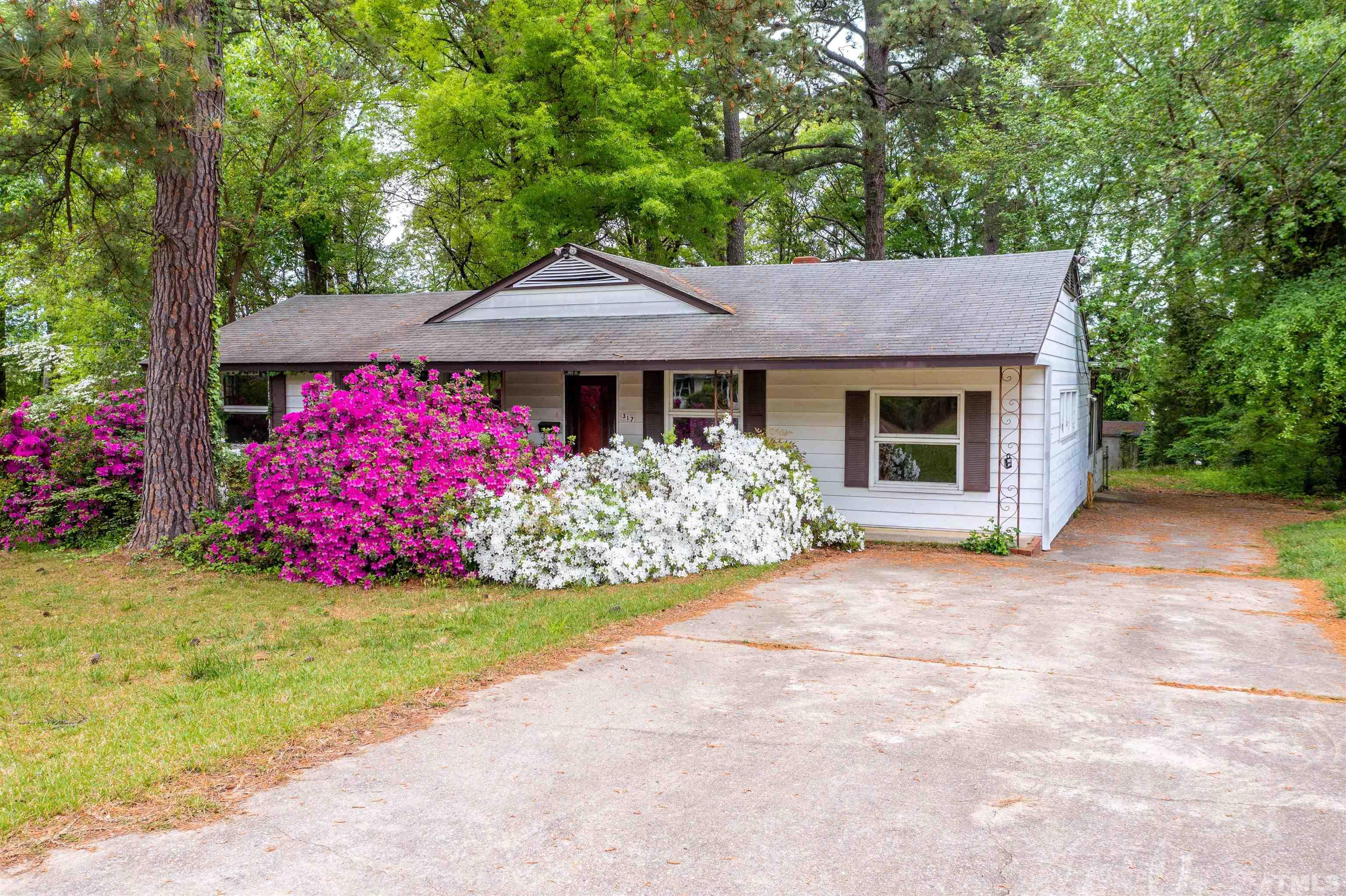 317 Quail Drive Raleigh, NC 27604 - Photo 27 of 29 a front view of house with yard