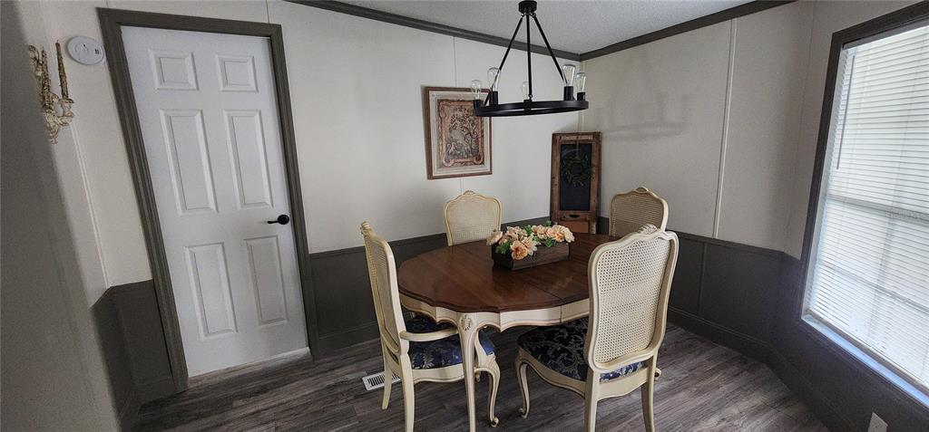19865 Southwest 5th Place Dunnellon, FL 34431 - Photo 32 of 78 a view of a dining room with furniture and window