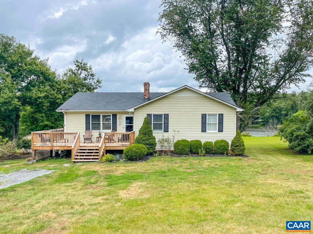 39 East Daffodil Road Ruckersville, VA 22968 - Photo 1 of 28 a front view of house with yard and green space