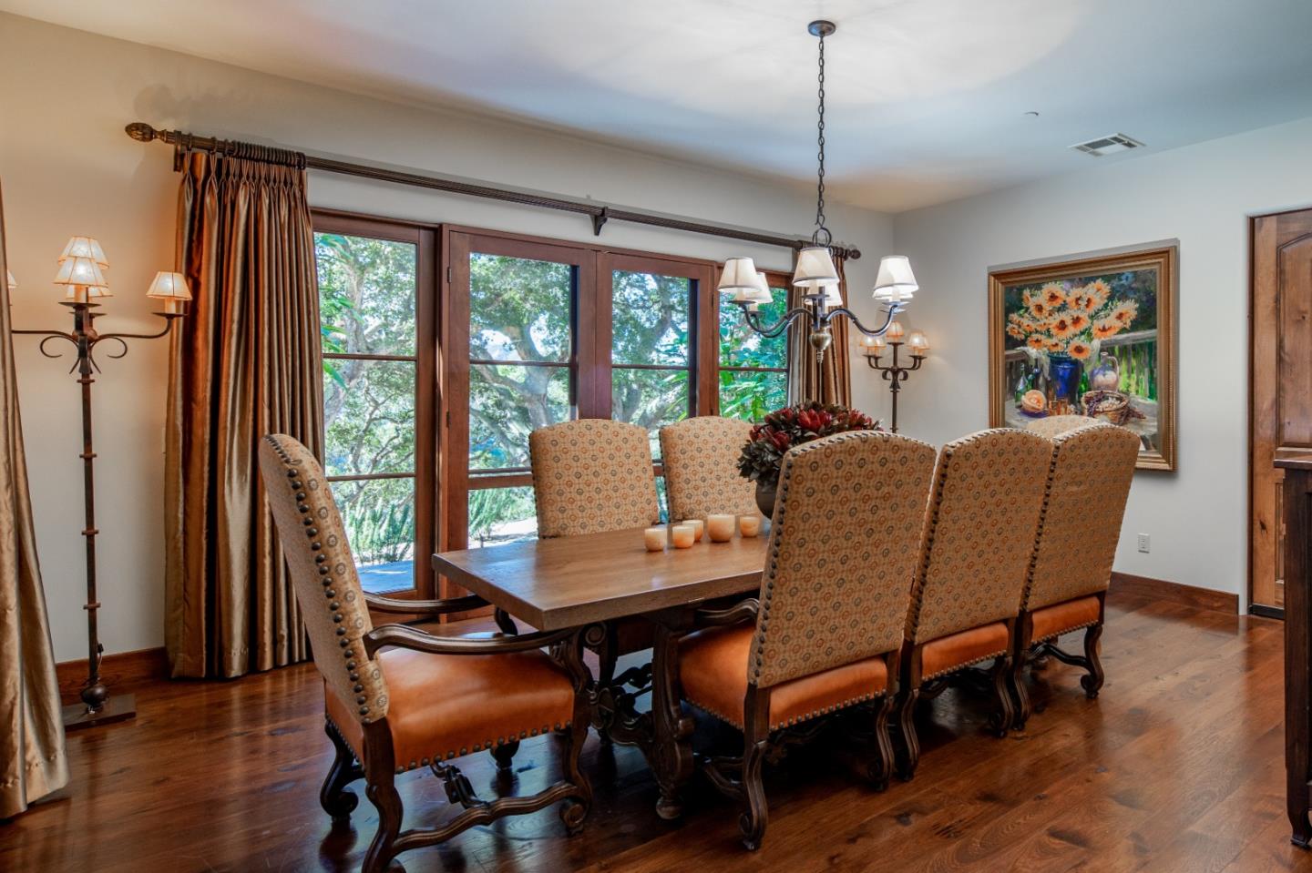 35 Rancho San Carlos Road Carmel, CA 93923 - Photo 14 of 47 a dining room with furniture a chandelier and wooden floor