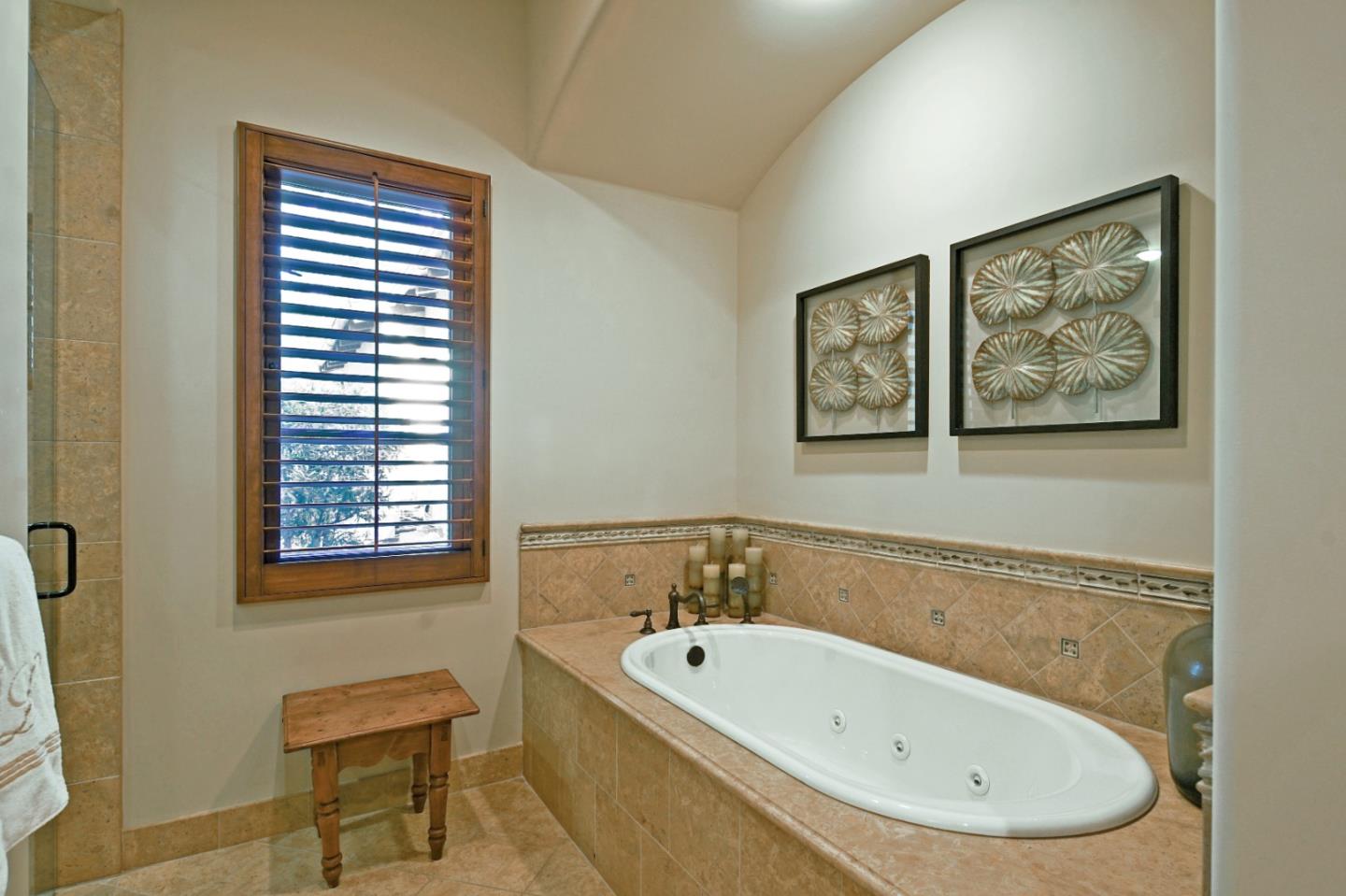 35 Rancho San Carlos Road Carmel, CA 93923 - Photo 25 of 47 a white bath tub sitting next to a small bathroom