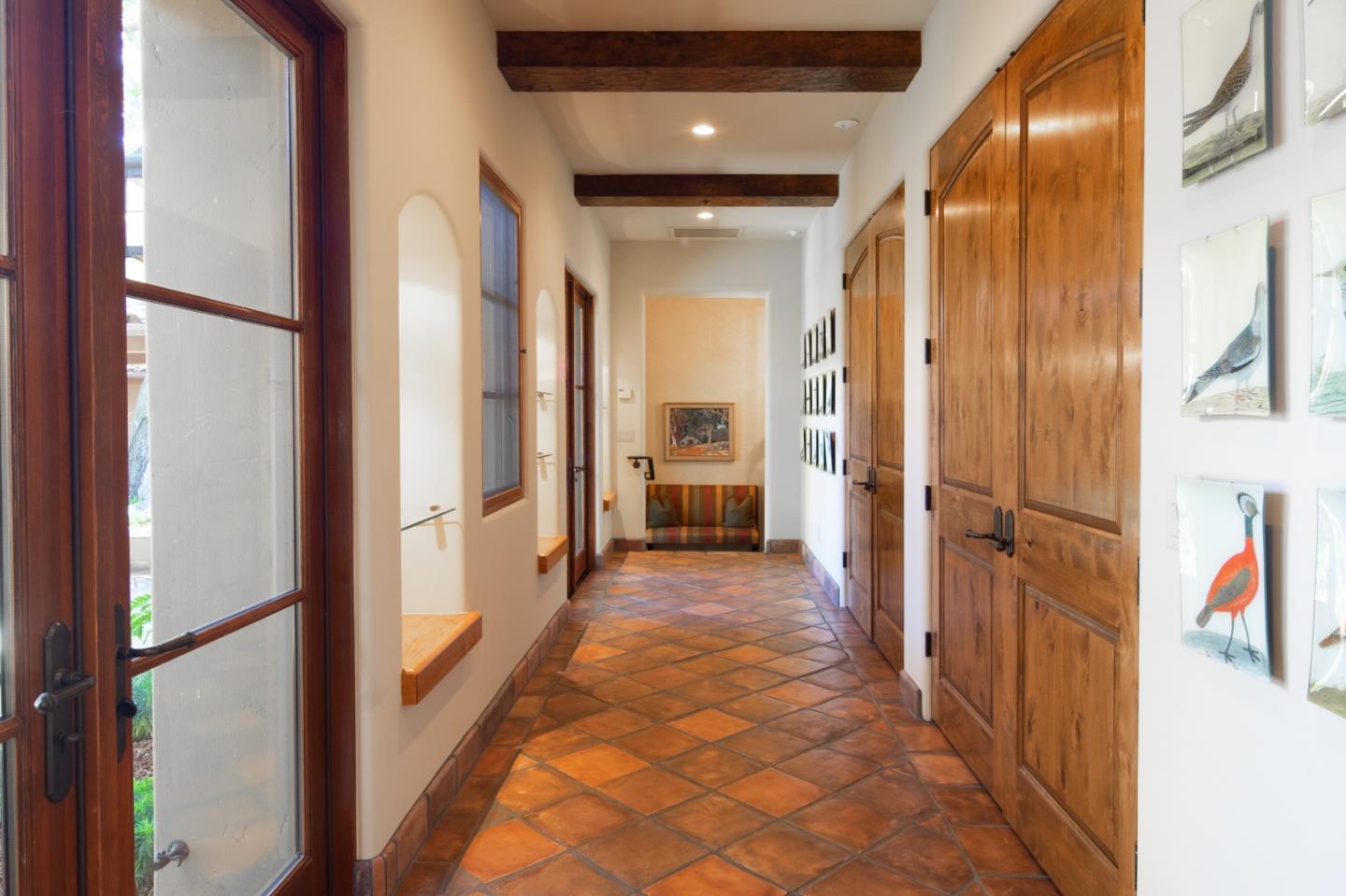 35 Rancho San Carlos Road Carmel, CA 93923 - Photo 26 of 47 a view of a hallway with wooden floor and staircase